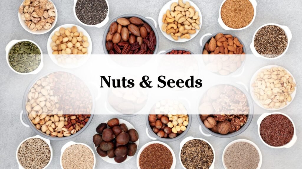 "nuts & seeds" back ground of bowls of all different types of mixed nuts from cashews and almonds to pumpkin and sunflower seeds.