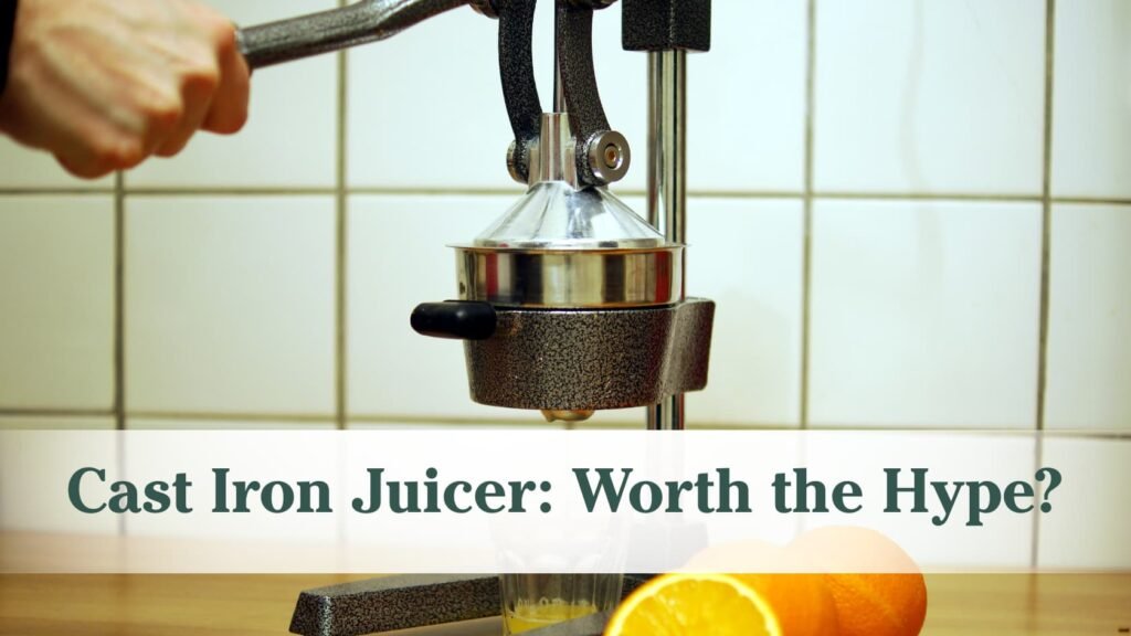 "Cast iron juicer: Worth the hype?" with a background of an arm pressing a orange in a cast iron juicer with some oranges sitting next to it.